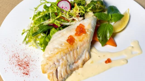 Cod fish with seasonal salad